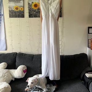 White sundress with two slides in the middle in front